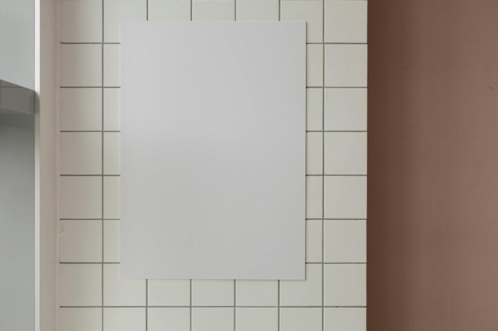 form and function empty paper on tiled wall